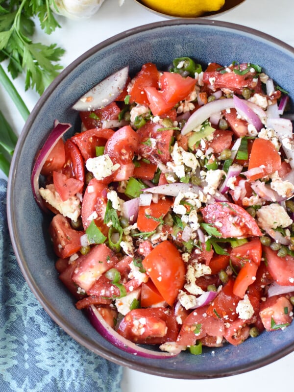 Easy Tomato Salad in a blue bowl.