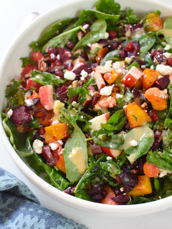 Fall Harvest Salad in a white bowl.