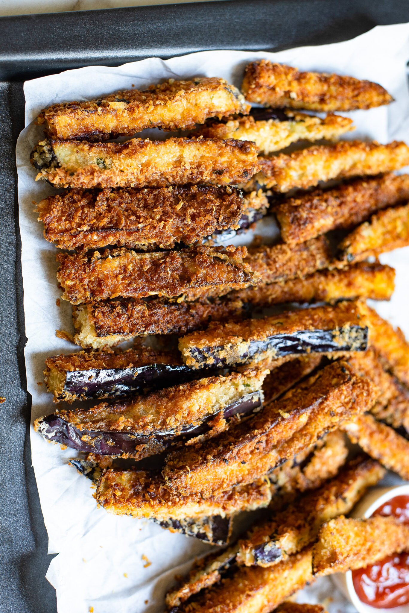 Air Fryer Eggplant Fries Recipe on a baking sheet. 
