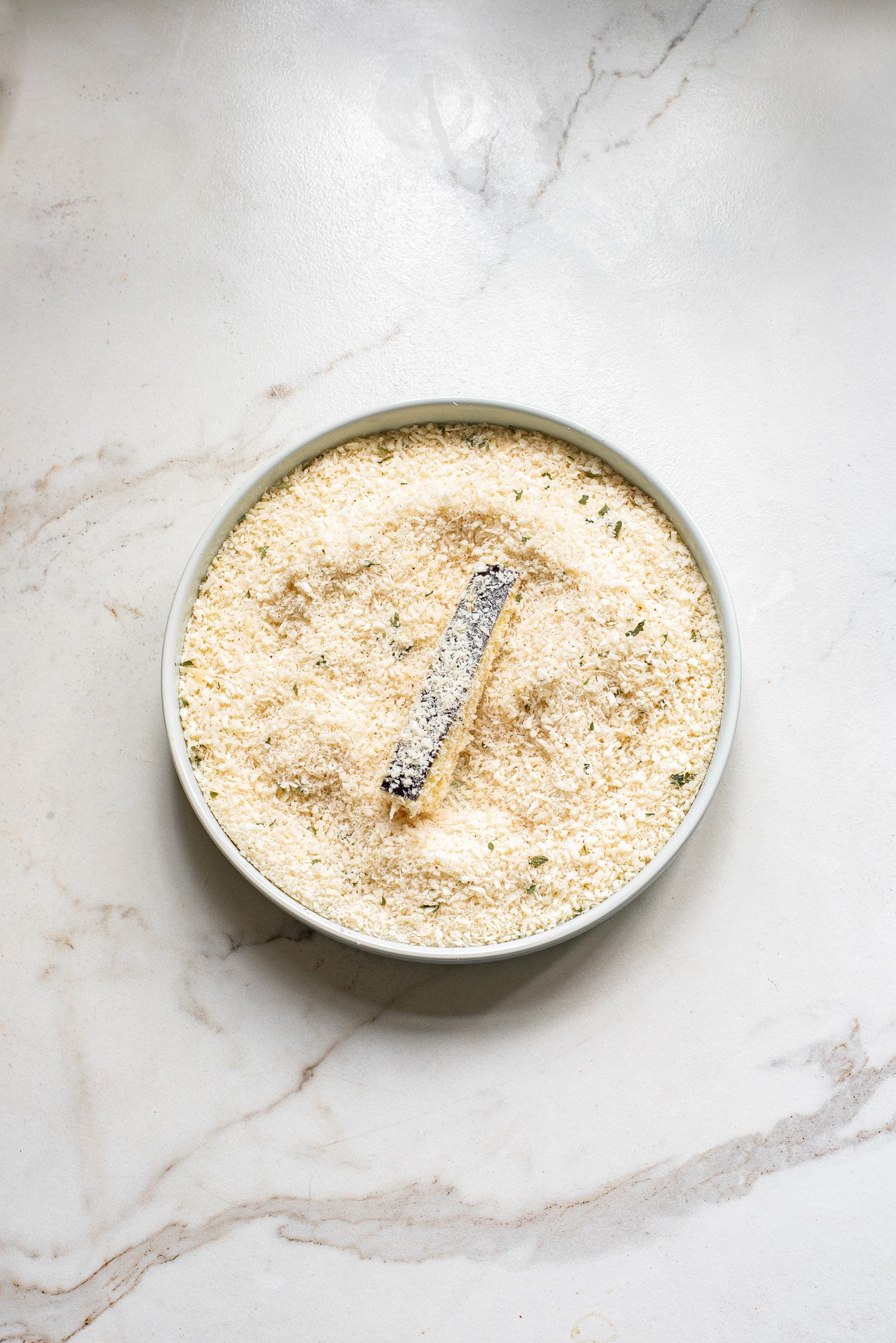 Air Fryer Eggplant Fries Recipe eggplant in the breadcrumb mixture. 