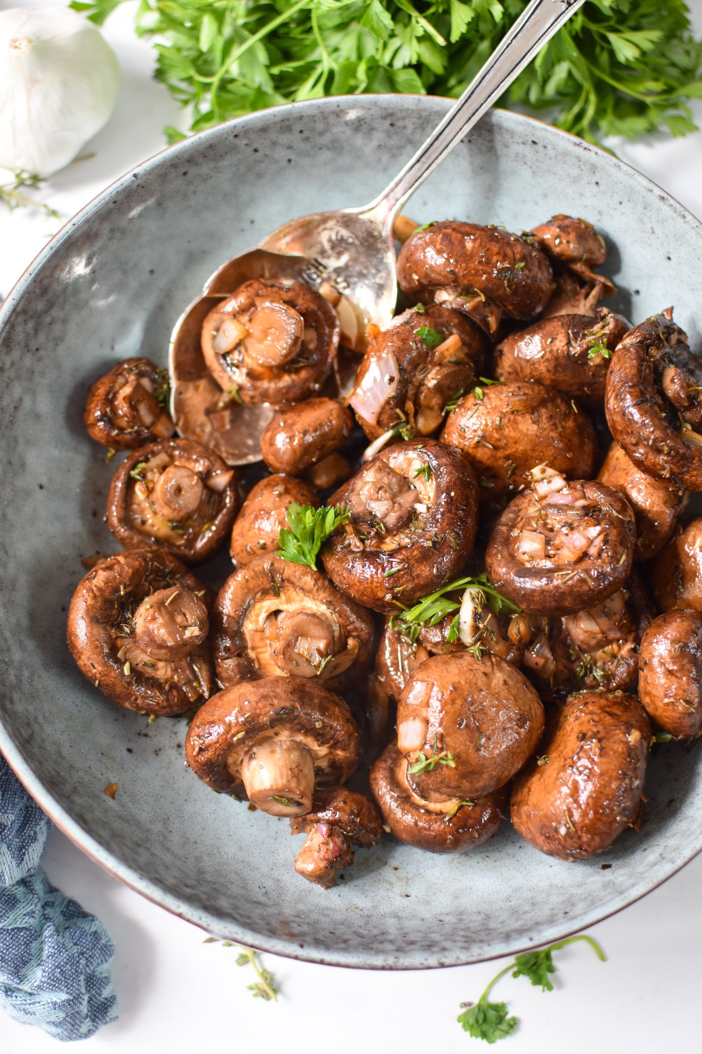 Roasted Balsamic Mushrooms in a blue bowl. 