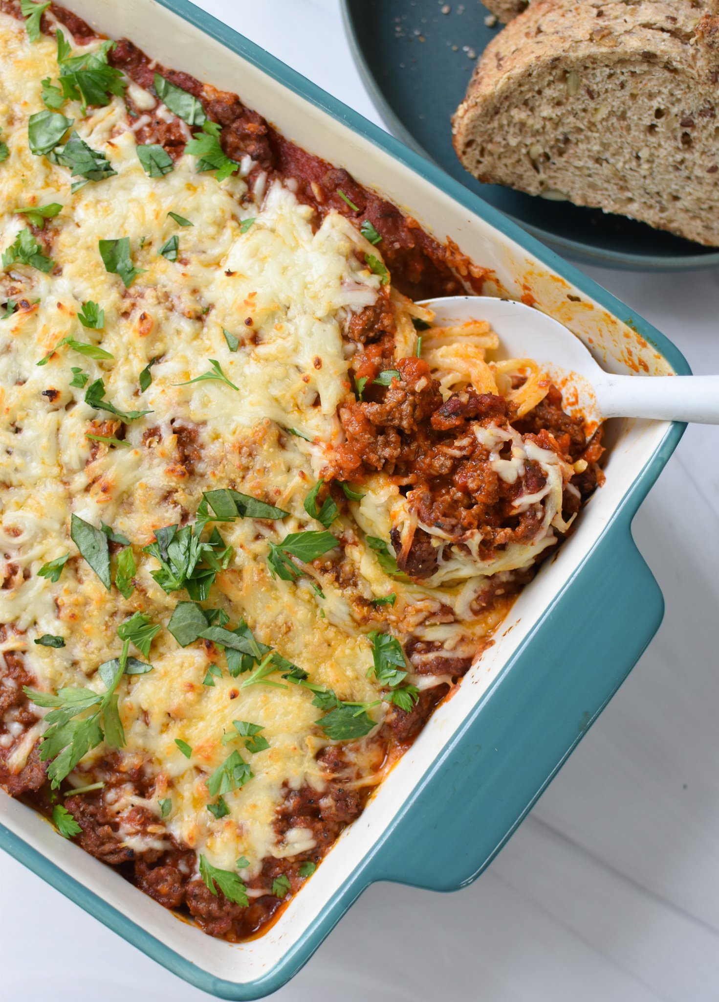 Spaghetti Pie Recipe with spoon.