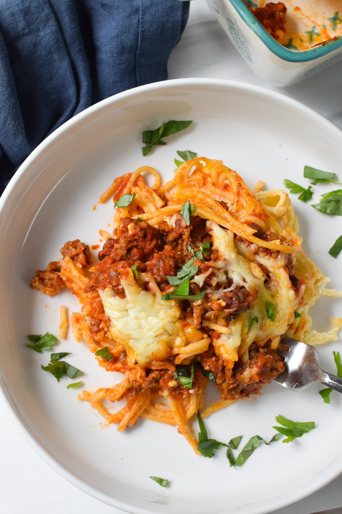Spaghetti Pie Recipe on a white plate.