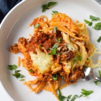 Spaghetti Pie Recipe on a white plate.