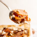 Easy Scalloped Sweet Potatoes on a spoon.