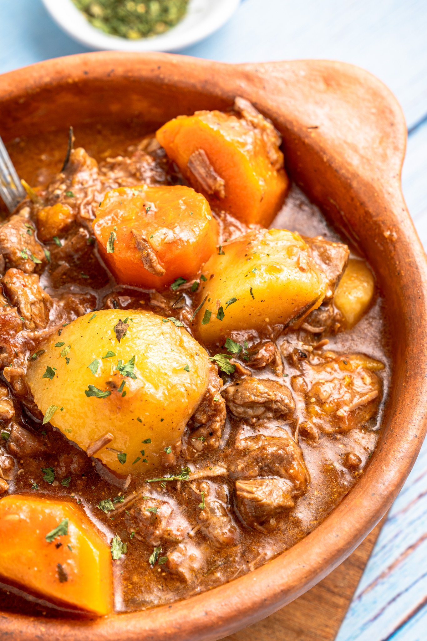 Crock Pot Beef Stew in a brown bowl.