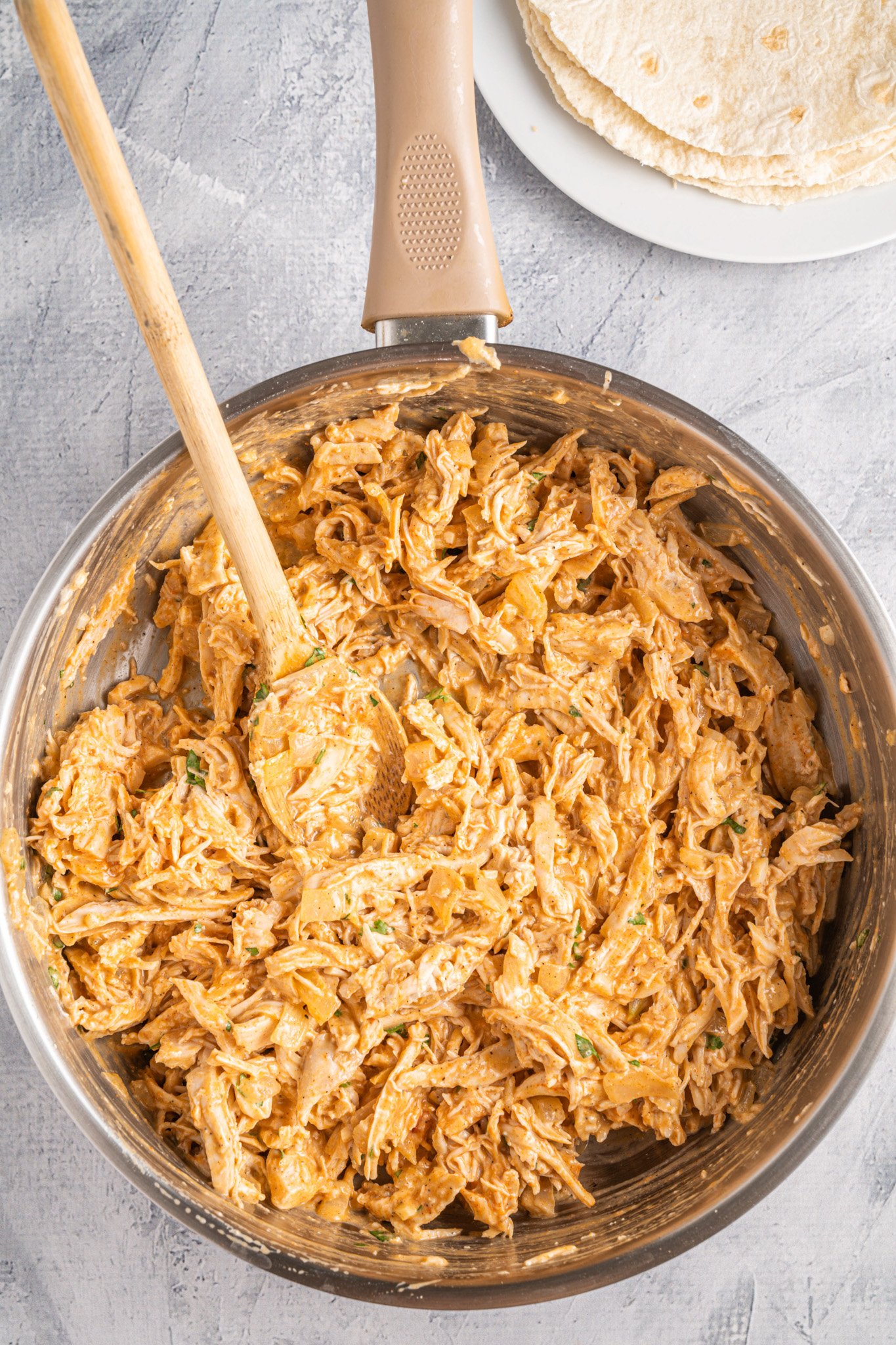 Easy Buffalo Chicken Quesadilla chicken mixed with sauce