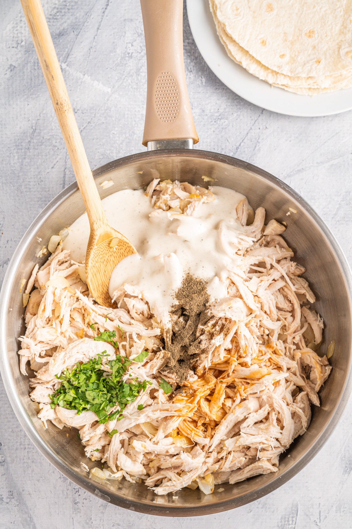Easy Buffalo Chicken Quesadilla chicken in a skillet