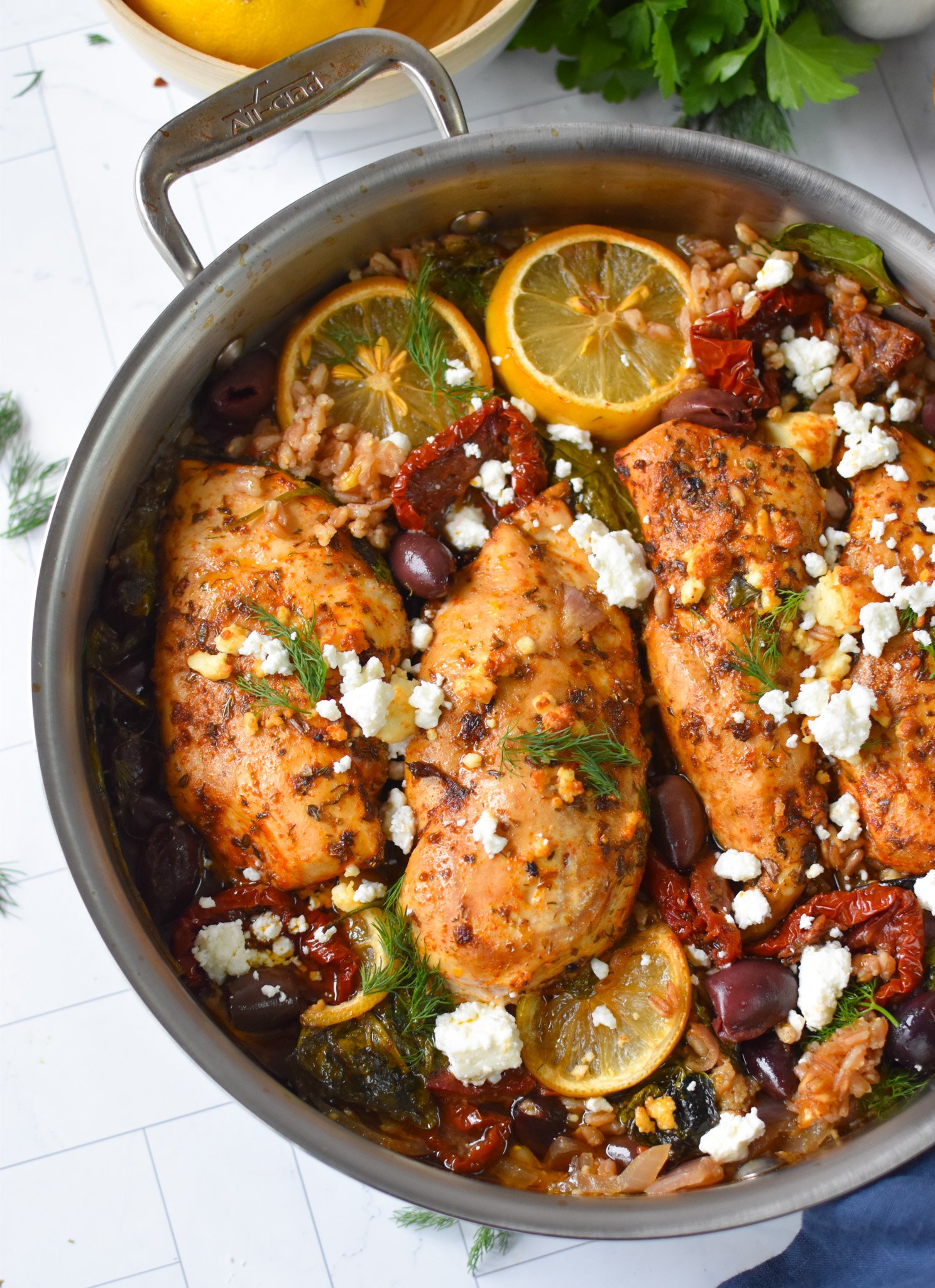 Sun-dried Tomato Farro Chicken Bake in a skillet.