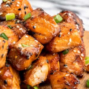 Air Fryer Salmon Bites on a cutting board.