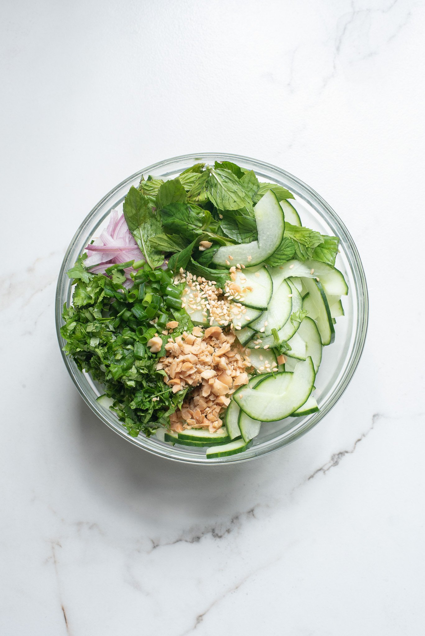 Thai Cucumber Salad ingredients in a bowl. 