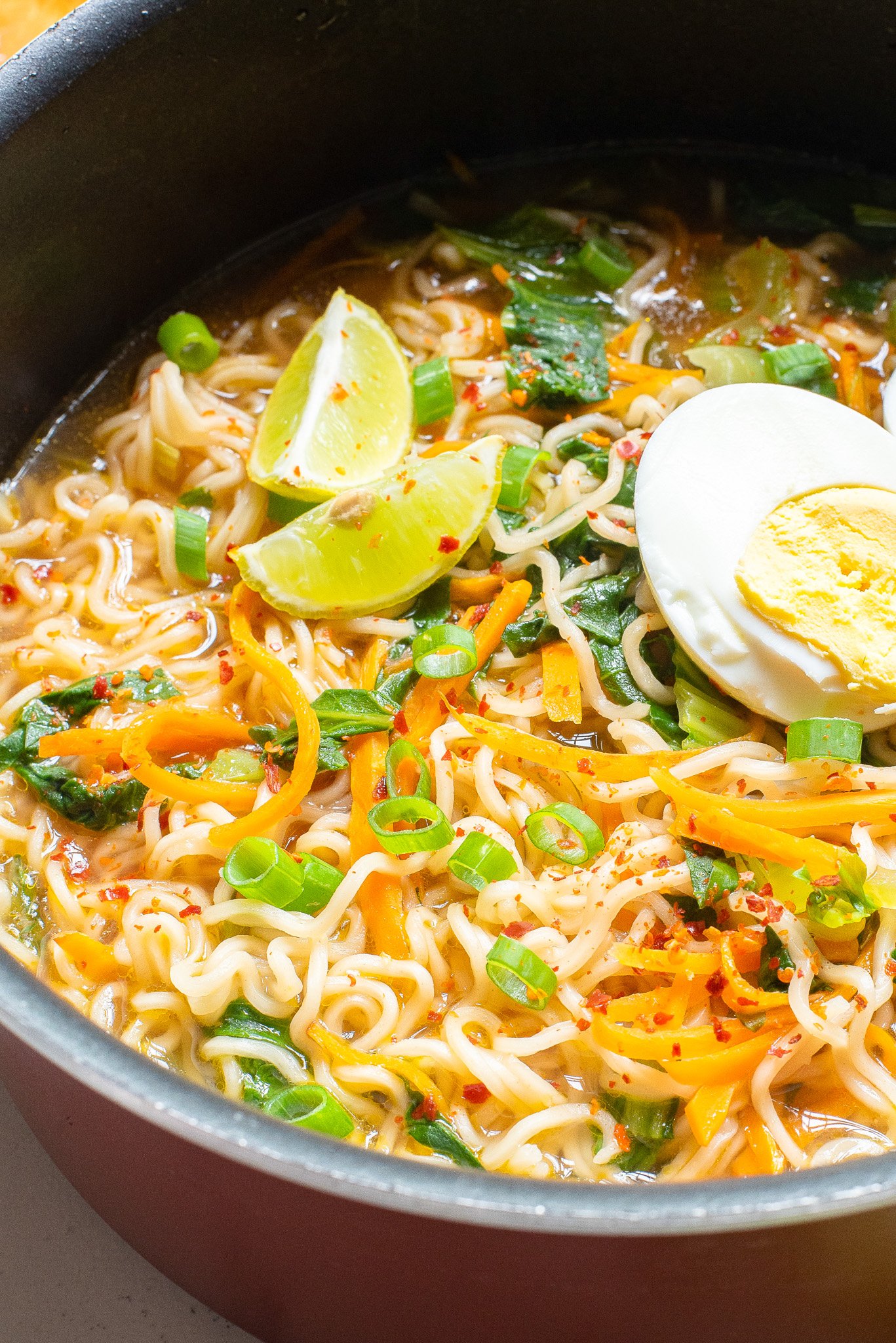 Easy Ramen Noodle Soup with lime wedges.