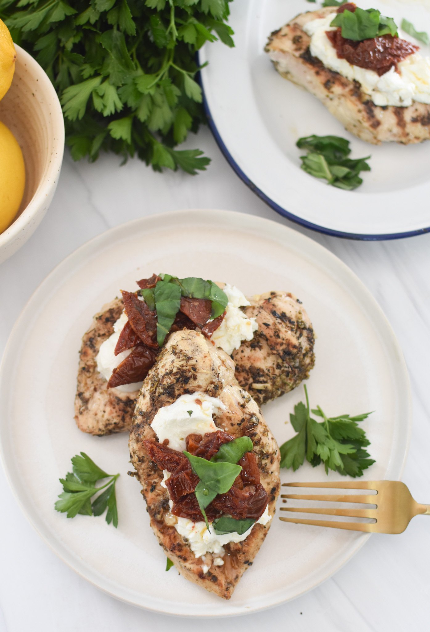 Chicken Bryan on plate with fork. 