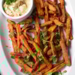 Oven Baked Carrot Fries on a white oval plate.