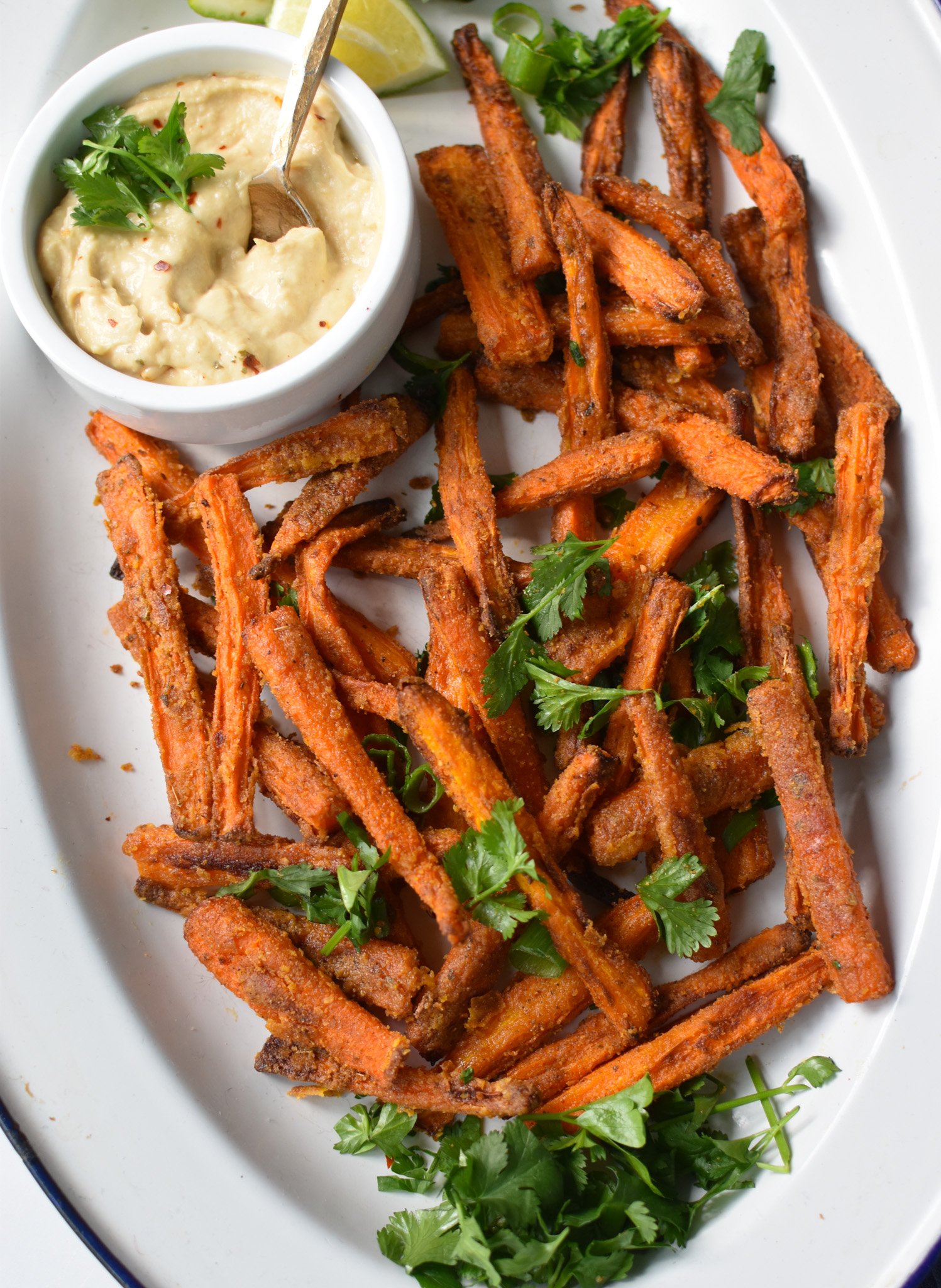 Oven Baked Carrot Fries on a white oval plate.