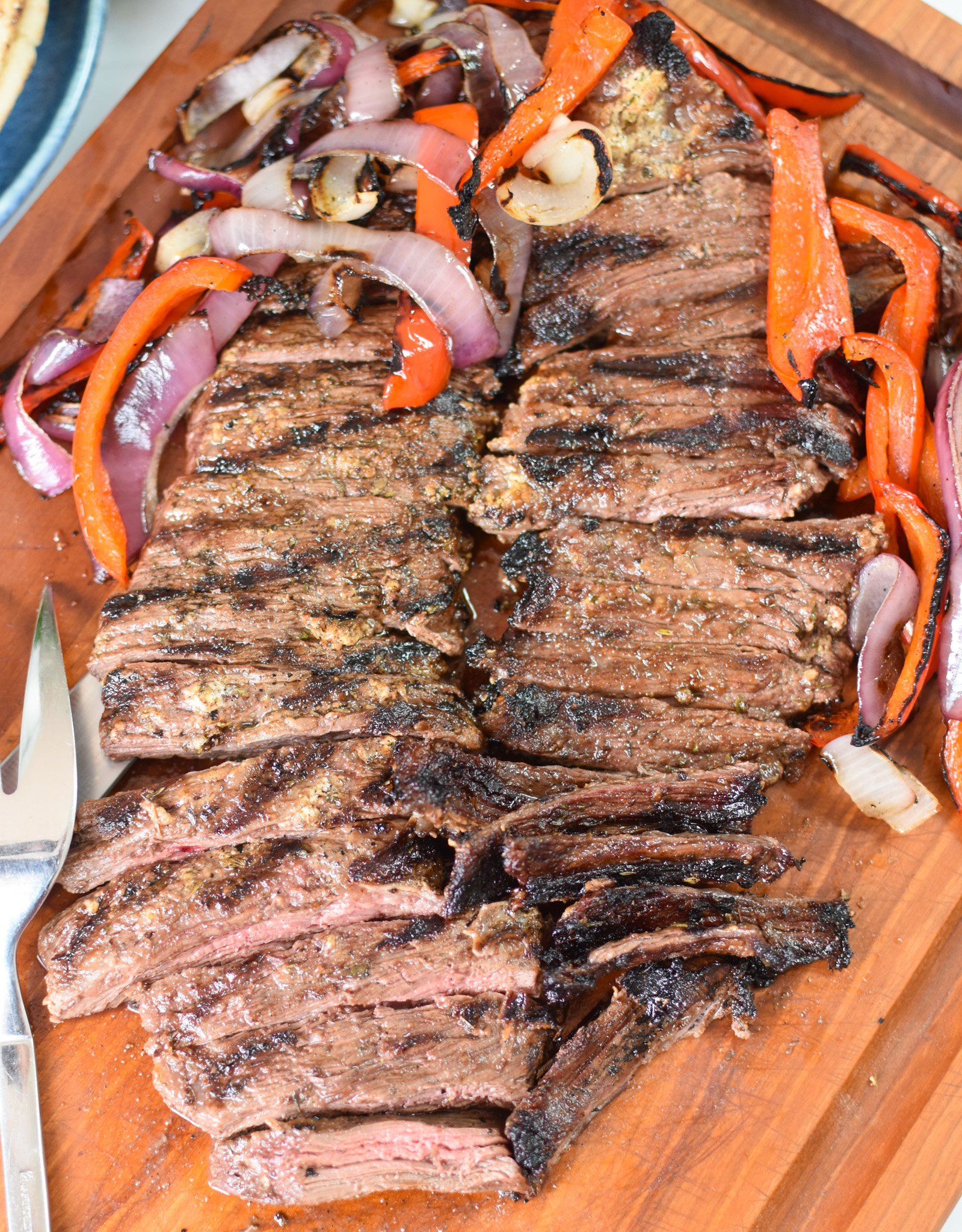 Easy Beef Gyros beef on a cutting board.
