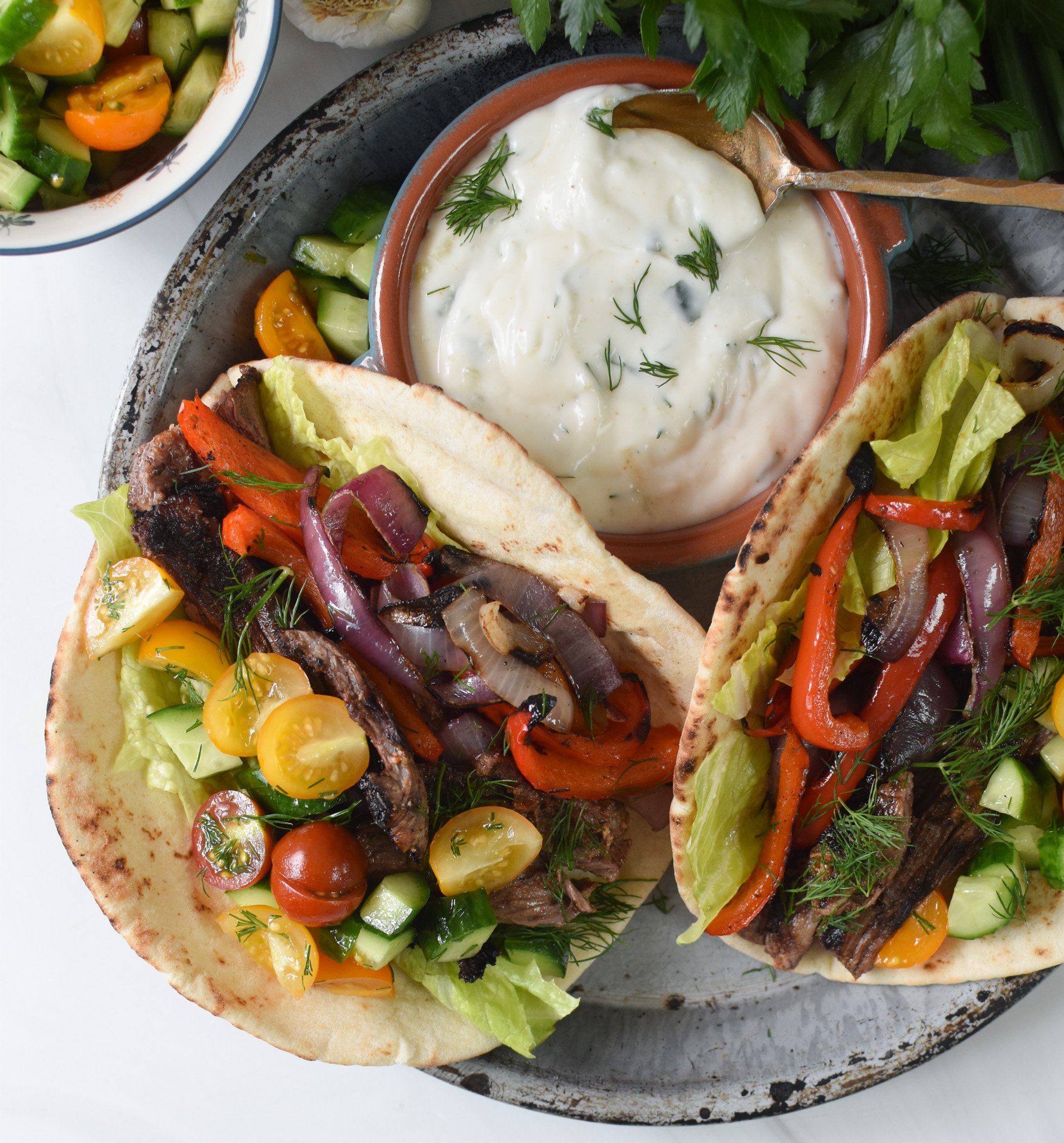 Easy Beef Gyros two gyros in a plate.