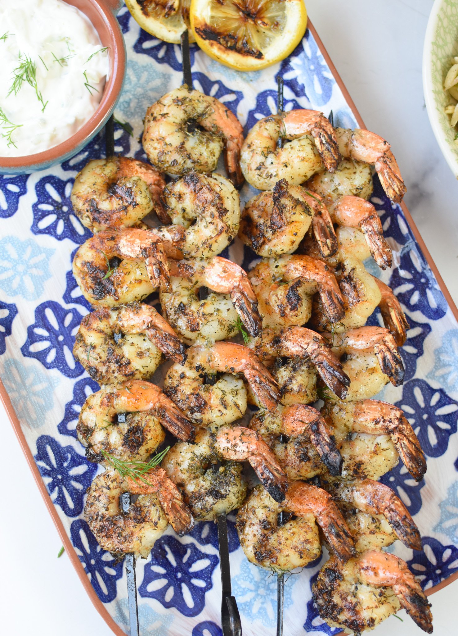 Greek Shrimp Marinade on a blue plate.