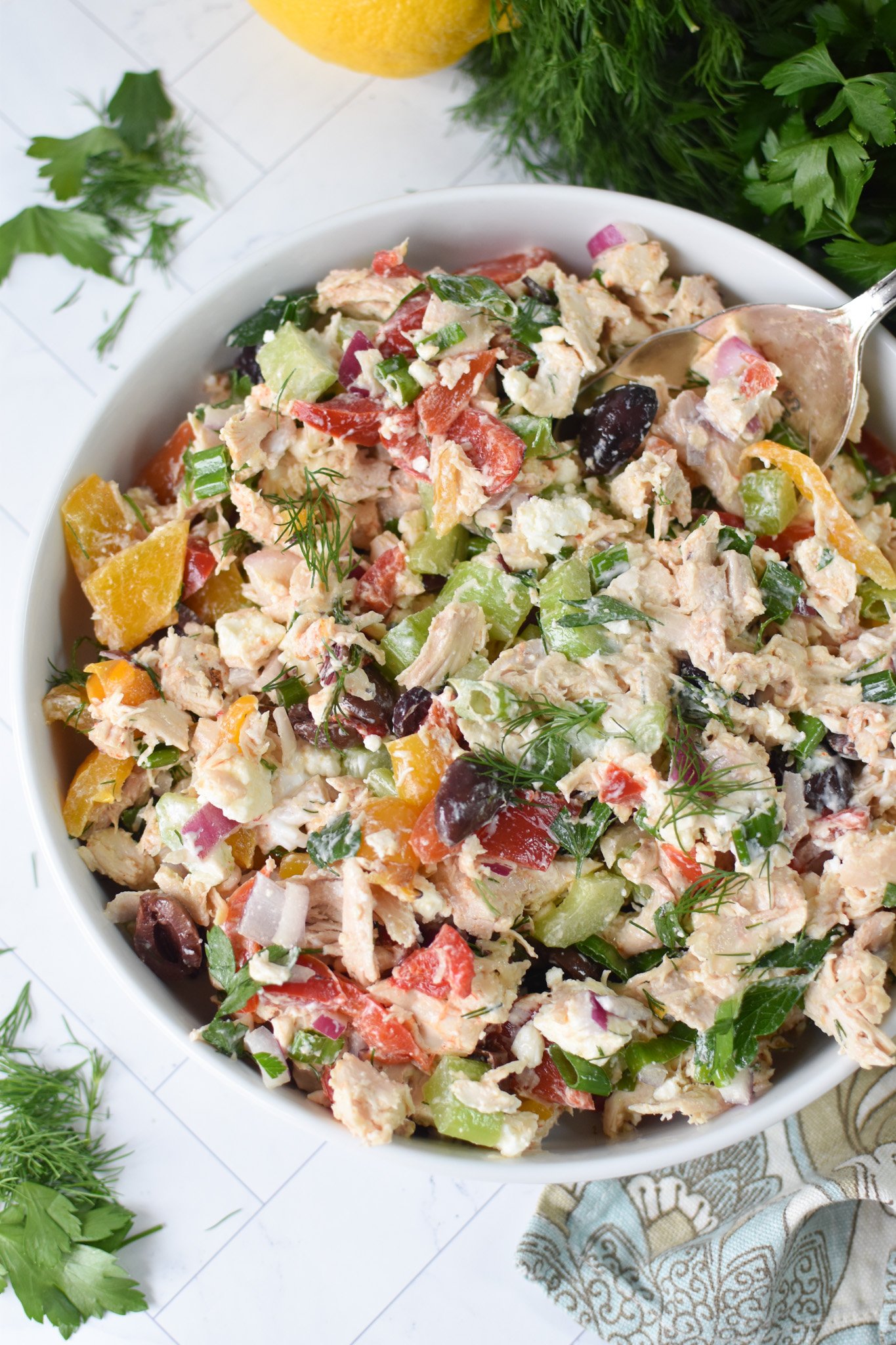 Healthy Mediterranean Chicken Salad in a white bowl.