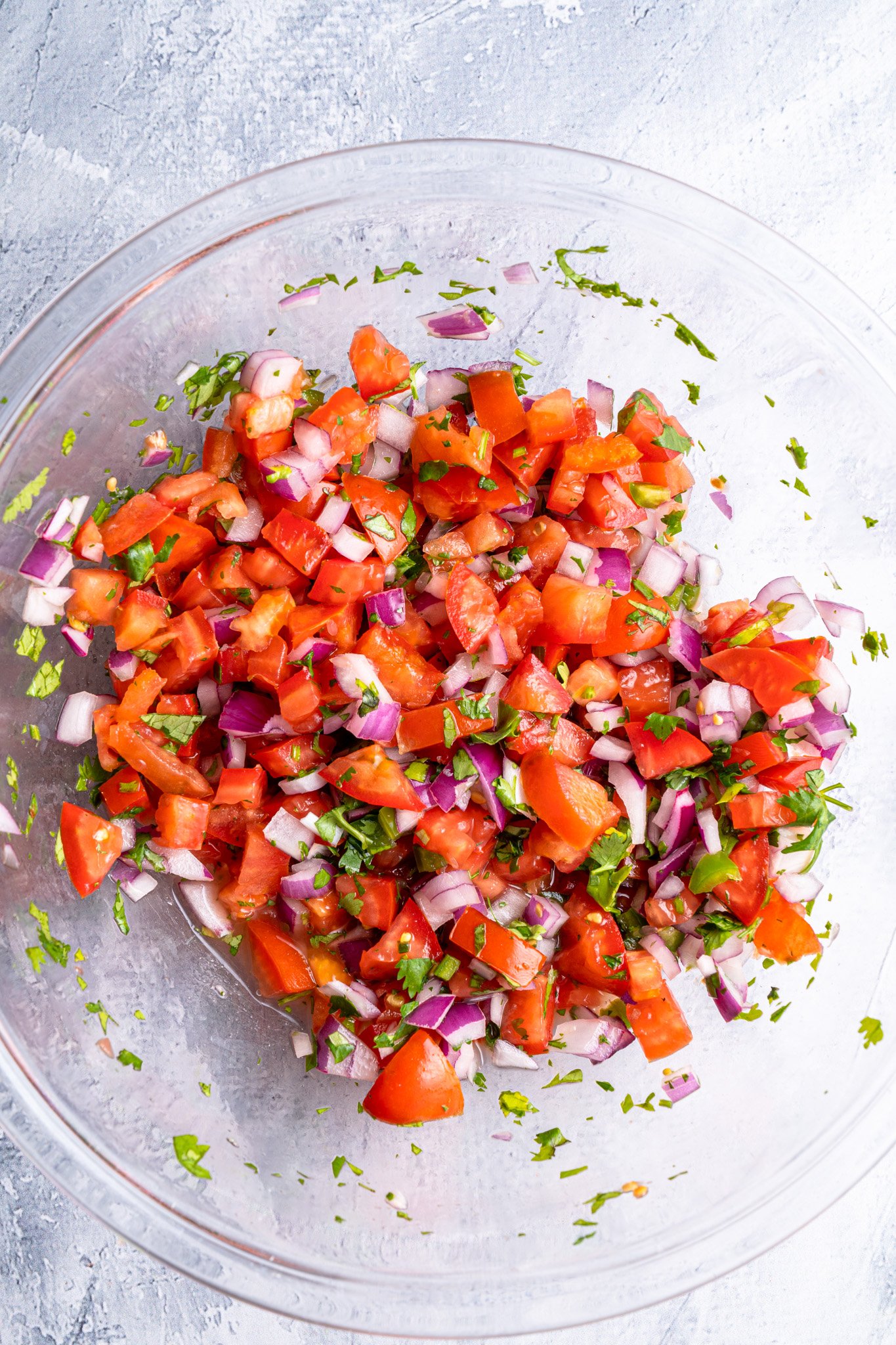 Homemade Pico de Gallo salsa mixed in a bowl. 