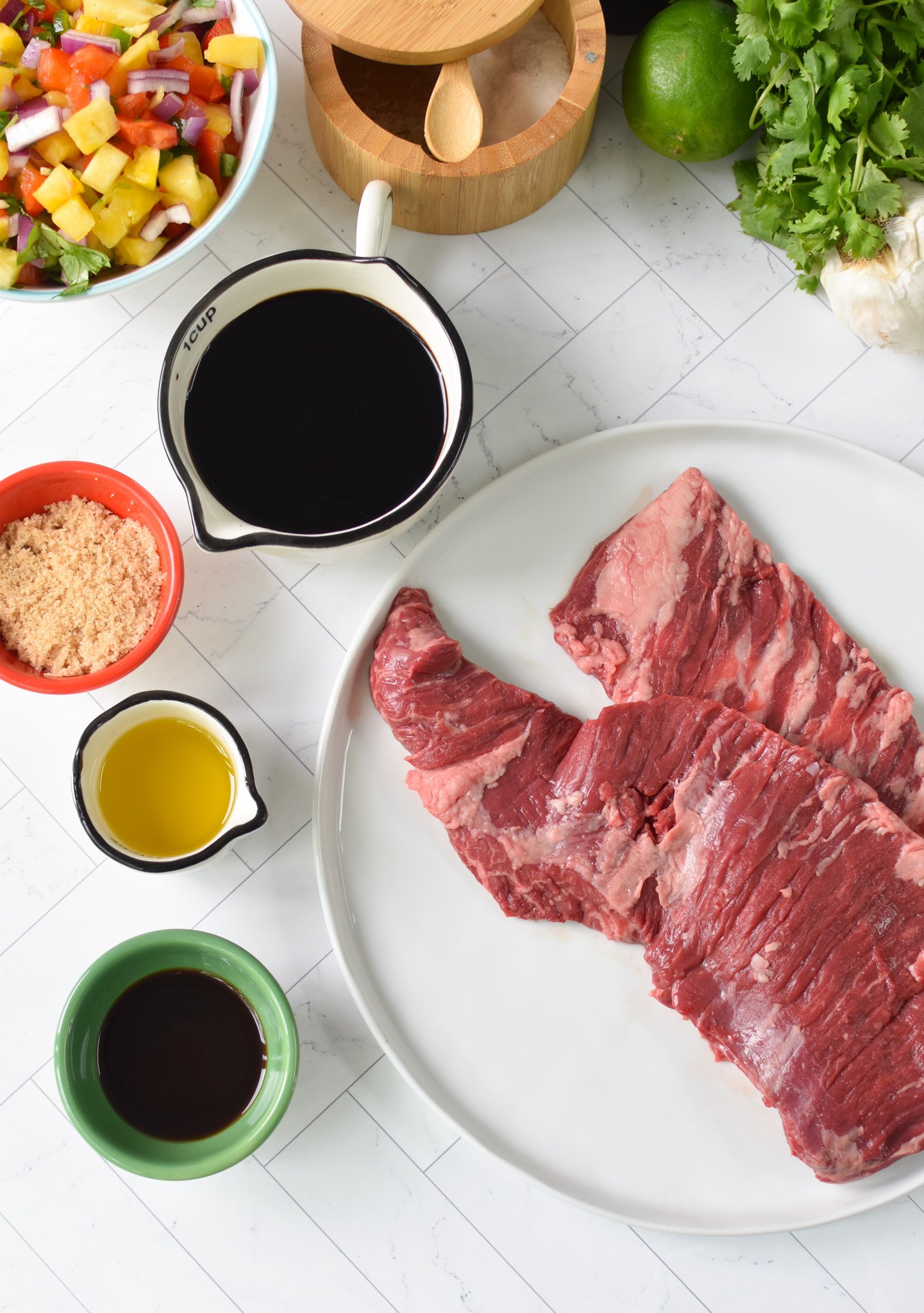 Balsamic Marinated Skirt Steak ingredients on a white board. 