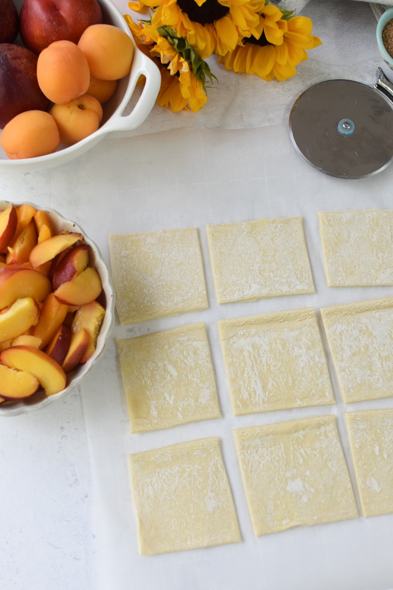 Easy Peach Tart cut puff pastry.
