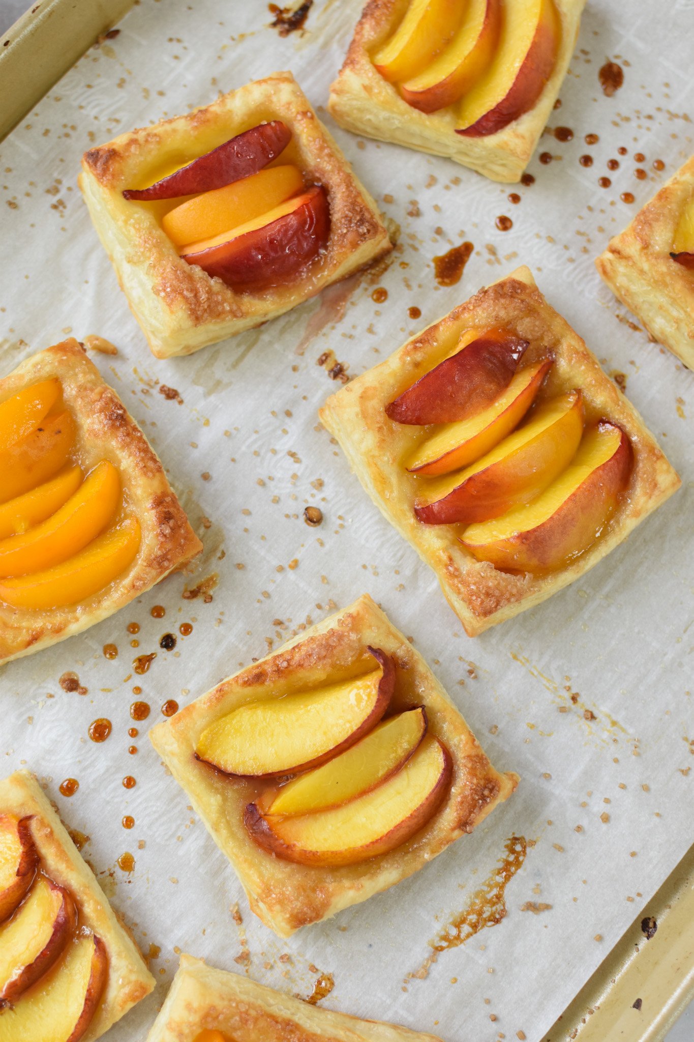 Easy Peach Tart tart on a baking sheet. 