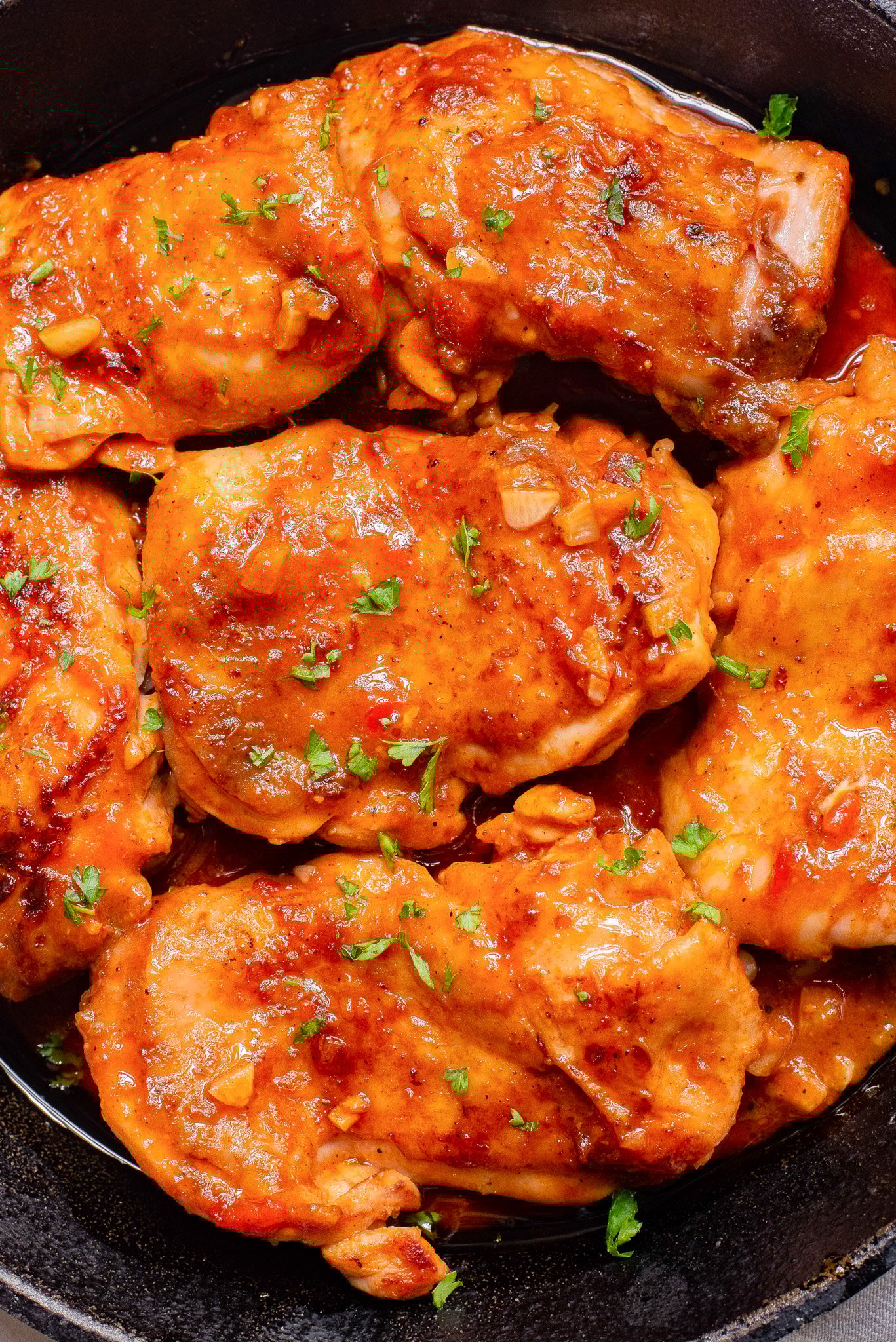 Harissa Chicken Recipe in a skillet.