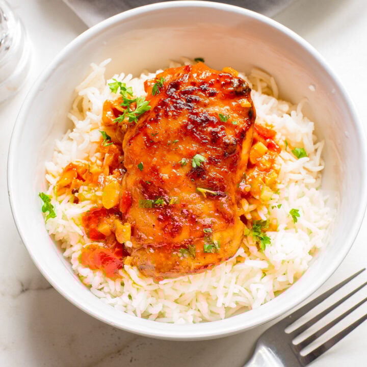 Harissa Chicken Recipe in a white bowl.