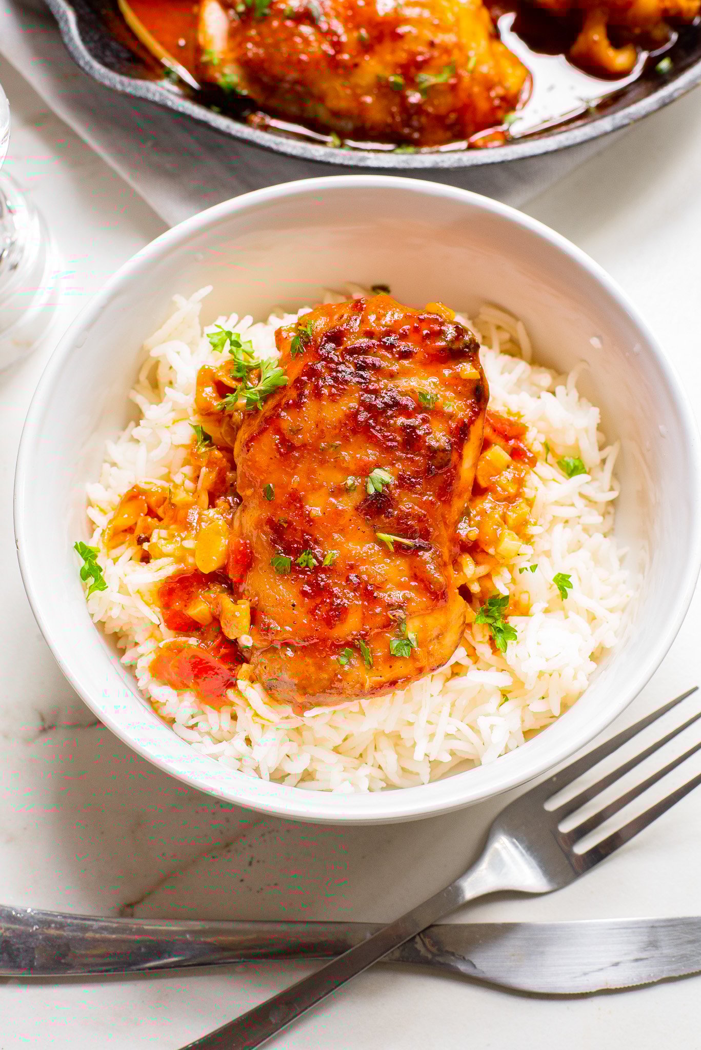 Harissa Chicken Recipe in a white bowl. 
