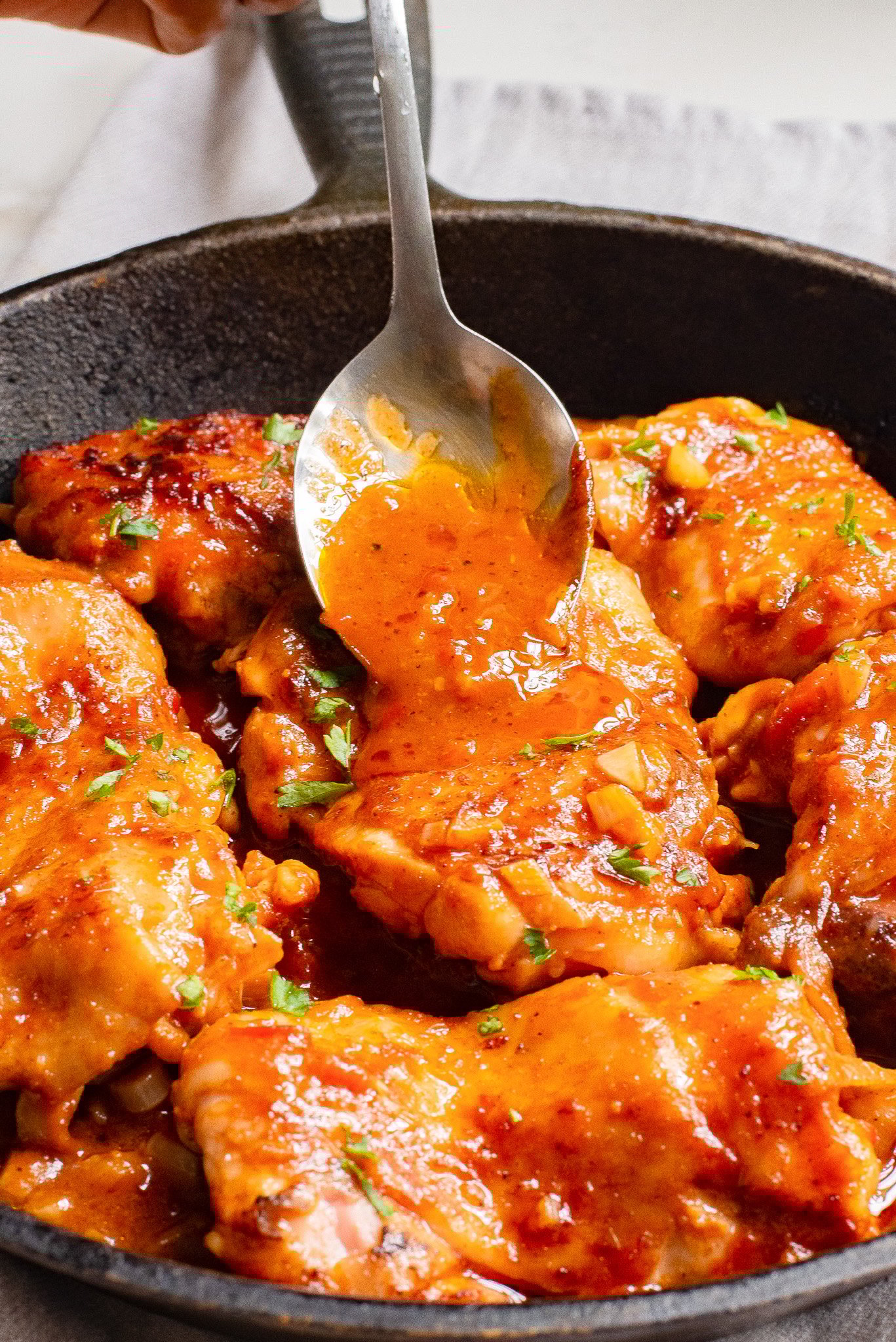 Harissa Chicken Recipe with sauce over chicken. 