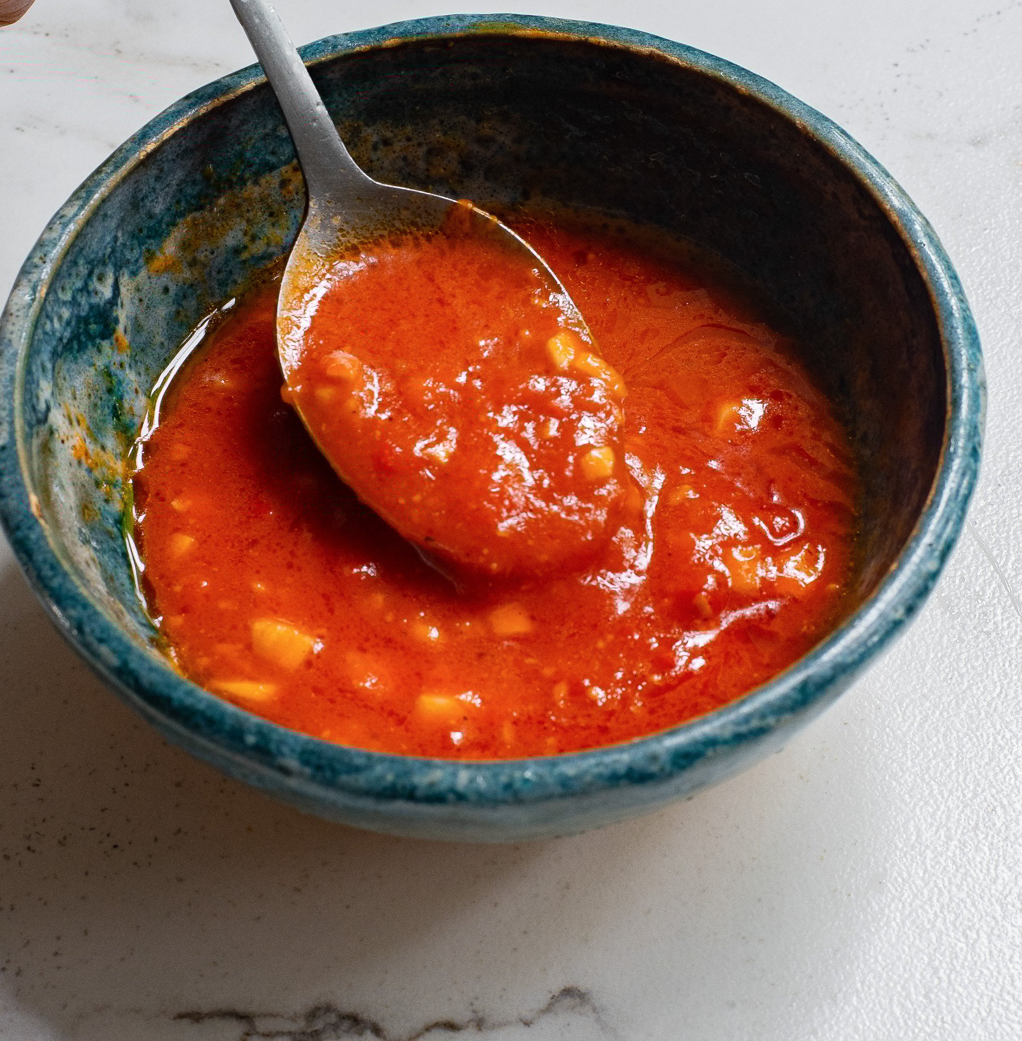 Harissa Chicken Recipe harissa paste in a bowl. 