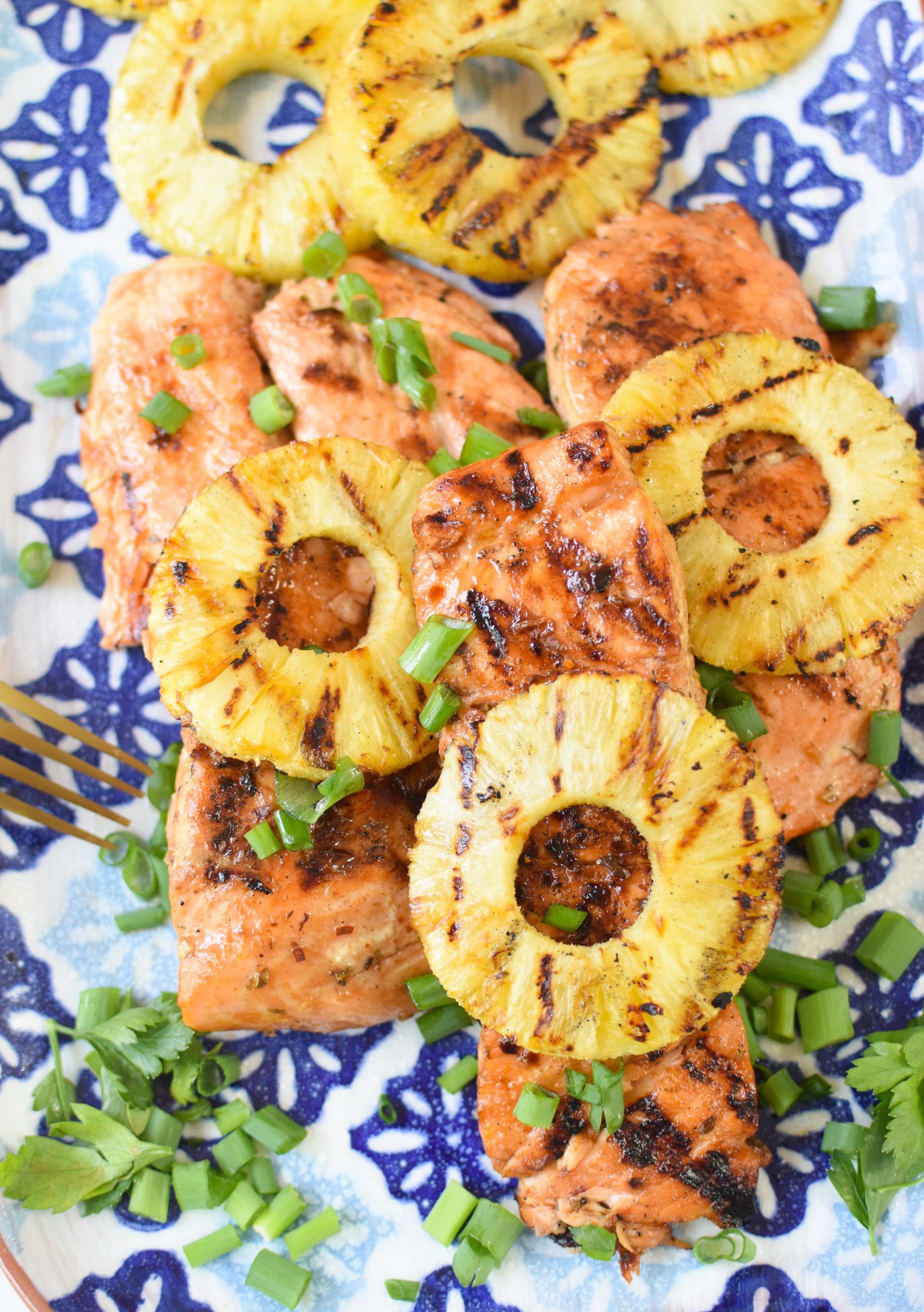 Hawaiian Grilled Salmon on blue platter. 