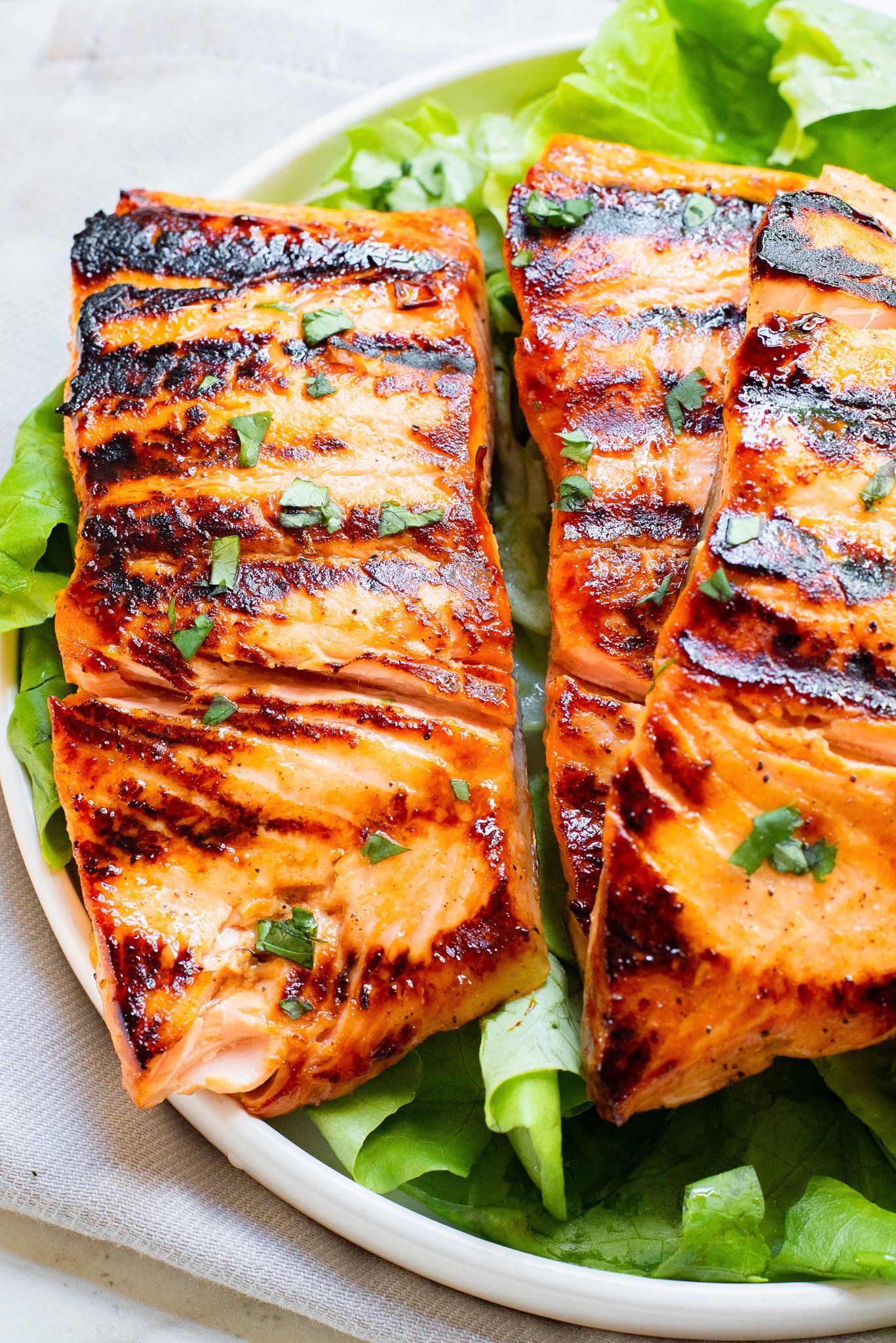 Honey Mustard Salmon multiple pieces on a platter. 
