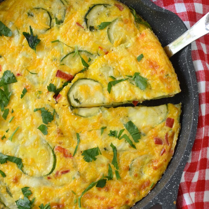 Zucchini Frittata Recipe with a pie cutter.