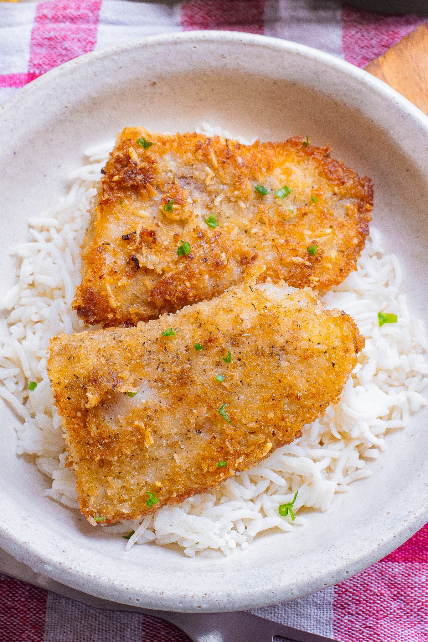 Easy Pan Fried Fish in a white bowl.