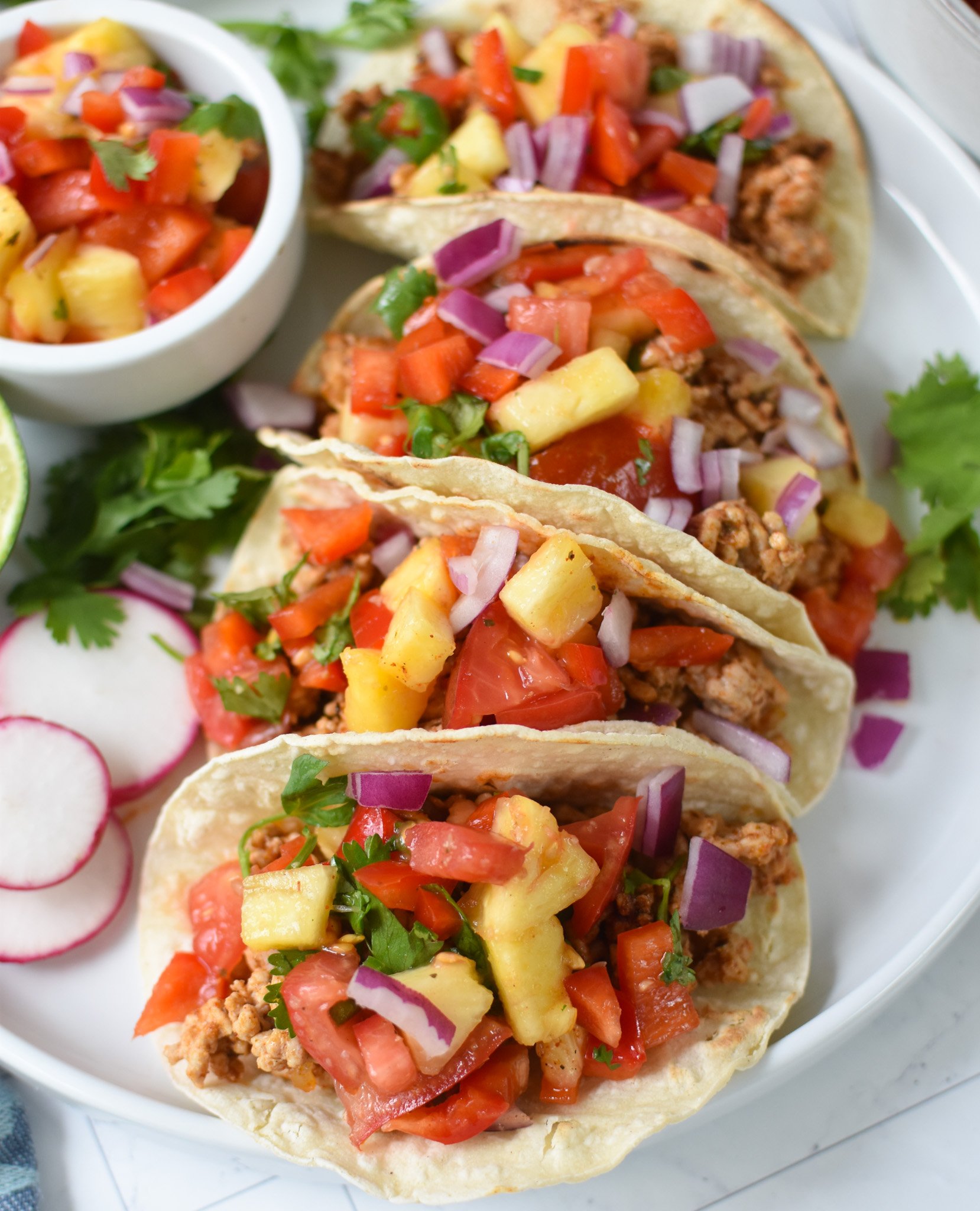 Easy Ground Pork Tacos tacos with pineapple salsa. 
