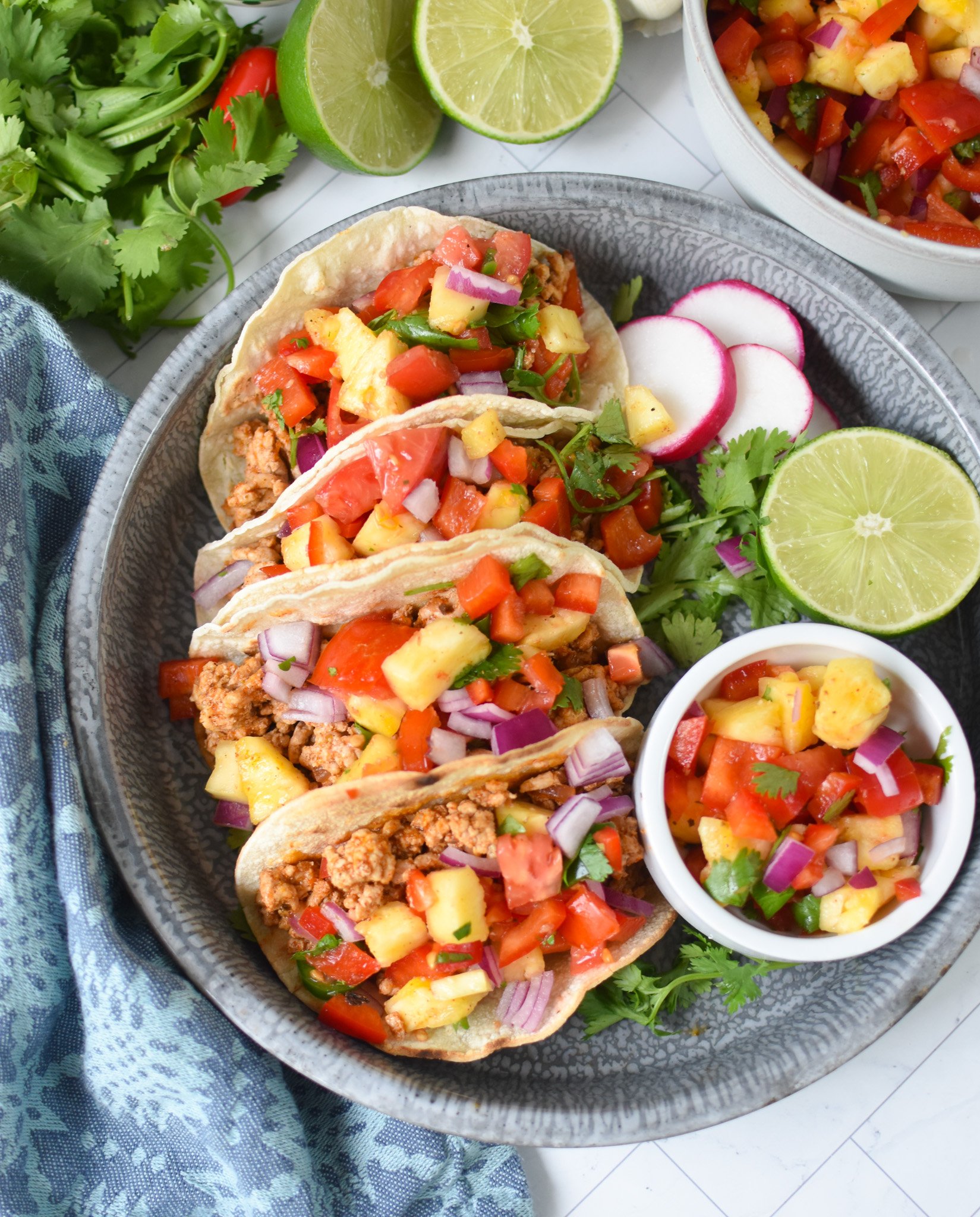 Easy Ground Pork Tacos on a blue platter.