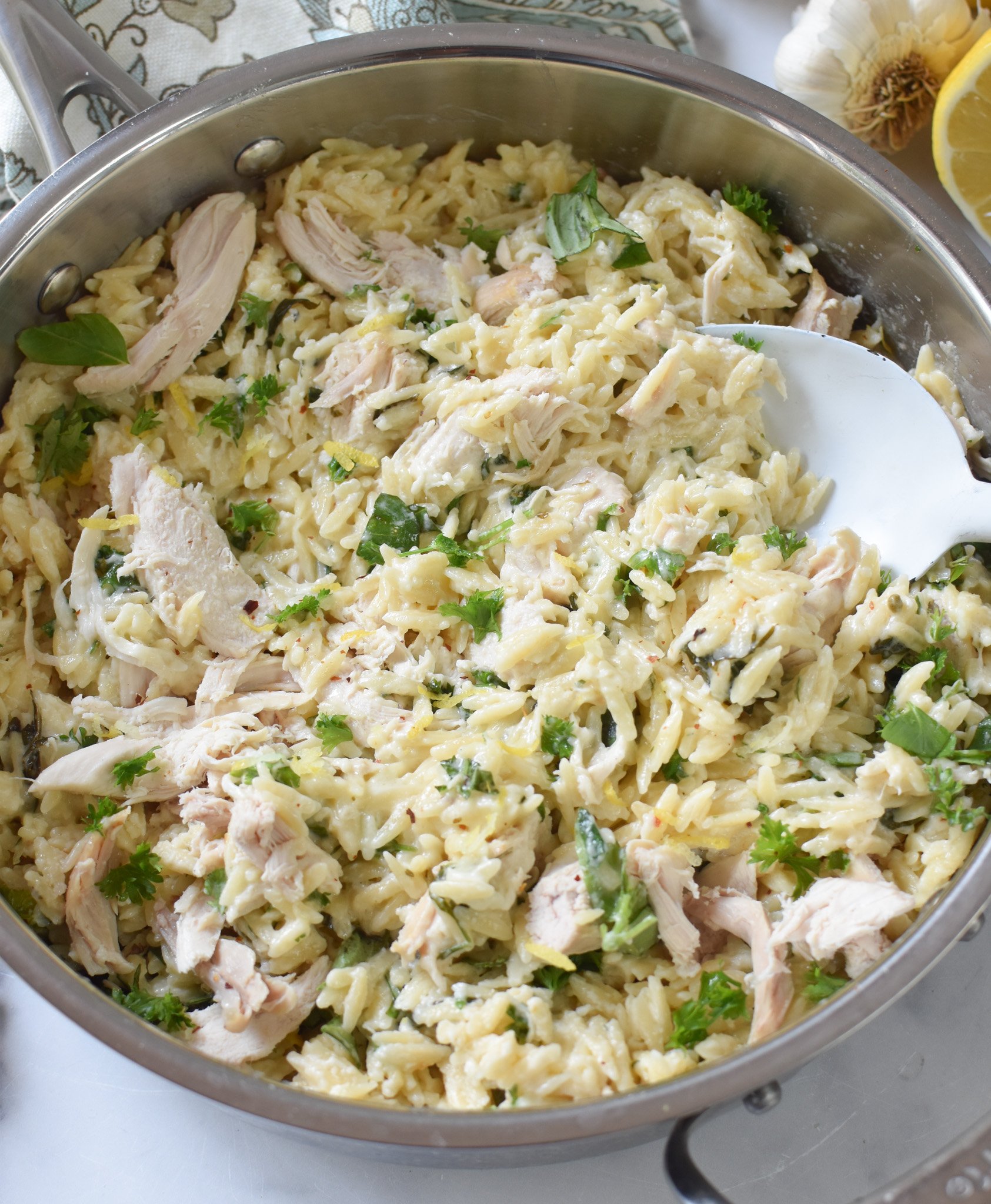 Lemon Chicken Orzo with spoon.