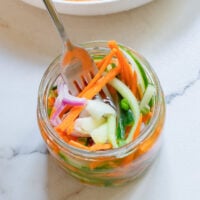 Quick Pickled Vegetables in a jar with a fork.