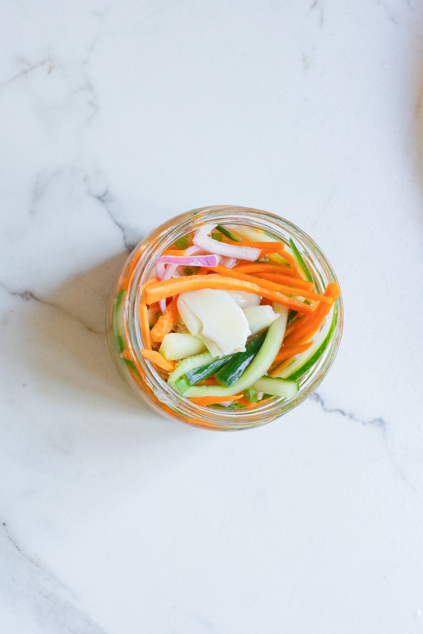 Quick Pickled Vegetables with garlic in a mason jar