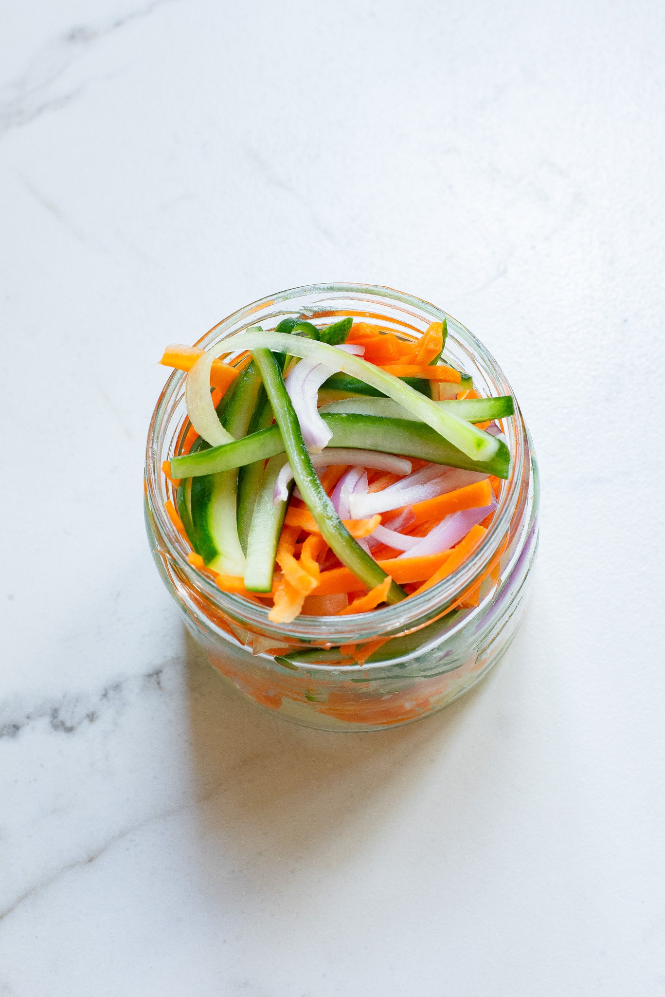 Quick Pickled Vegetables in a glass jar.