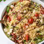 Caprese Orzo Pasta Salad with balsamic in a large bowl.