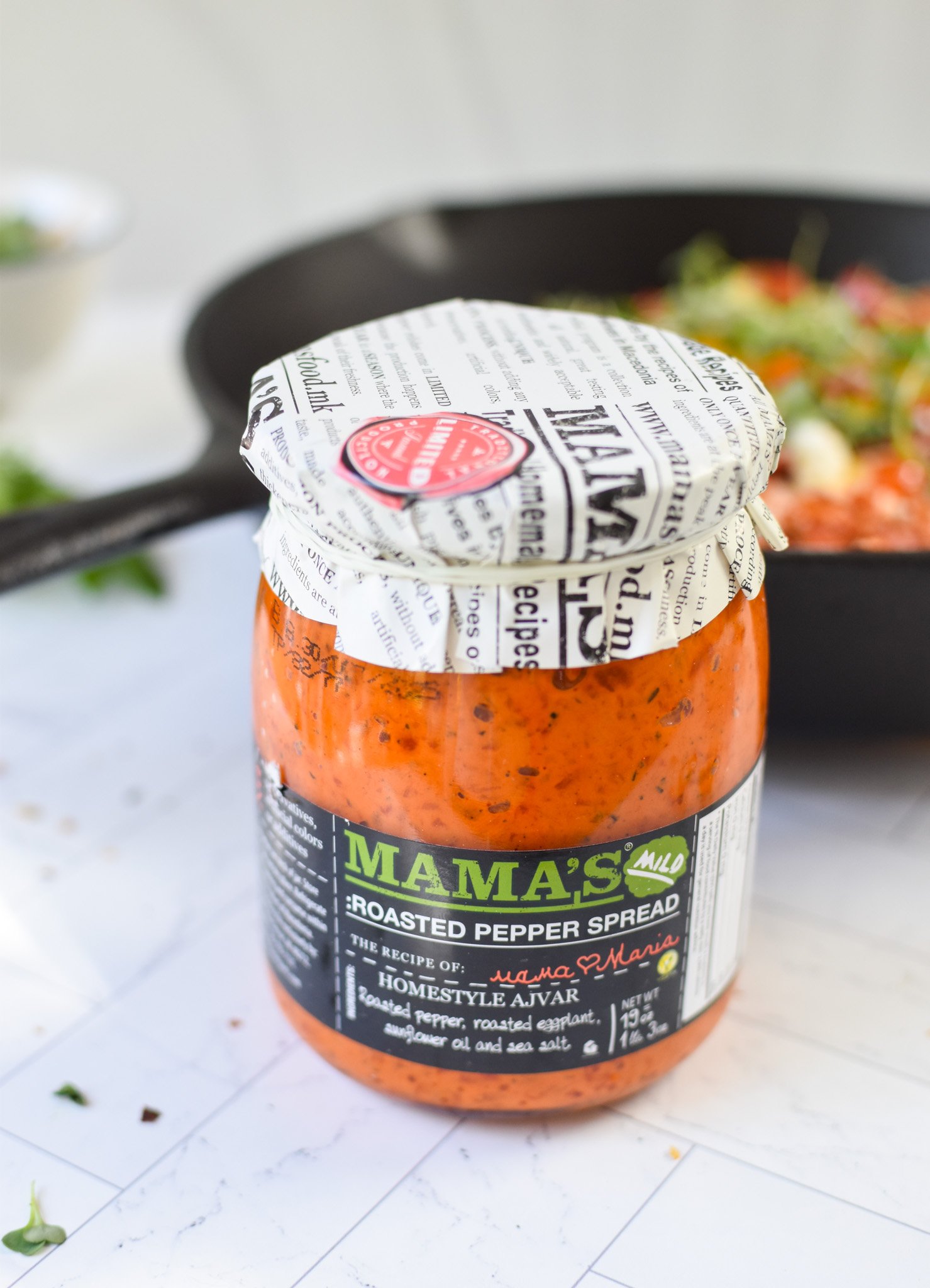 Cast Iron Mediterranean Pizza red pepper sauce. 