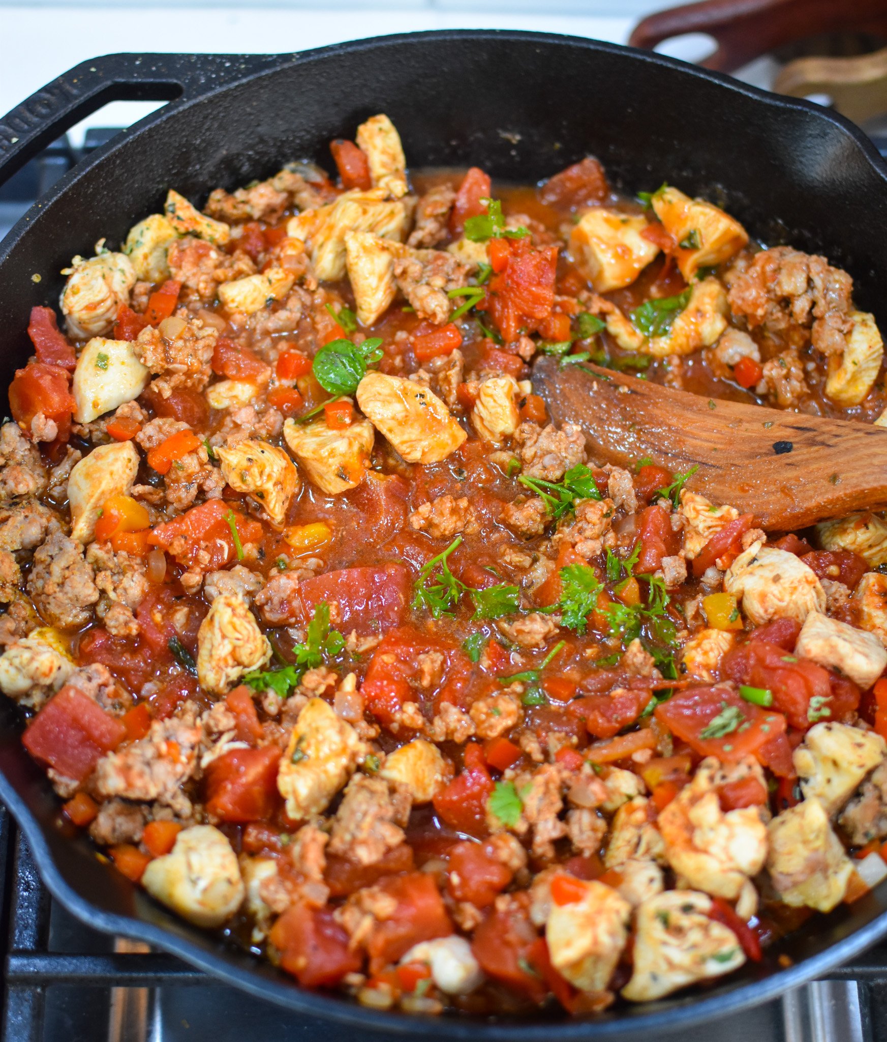 Creamy Chicken and Chorizo Pasta Recipe in a skillet. 