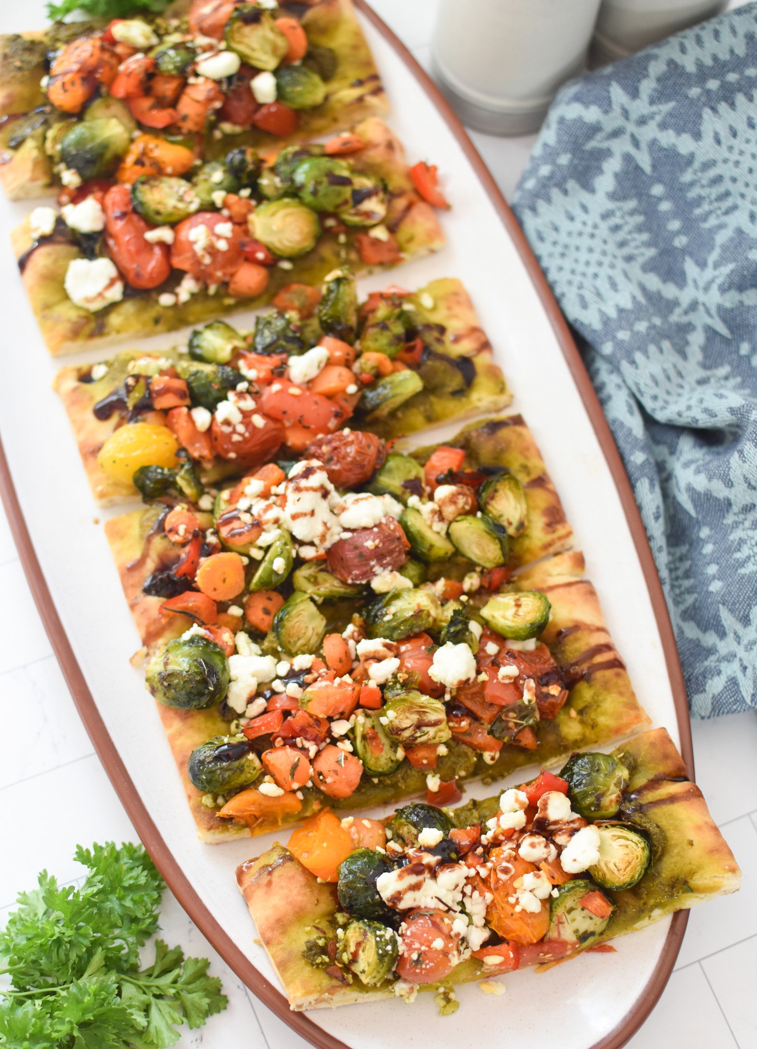 Roasted Vegetable Goat Cheese Flatbread Pizza Recipe cut flatbread. 