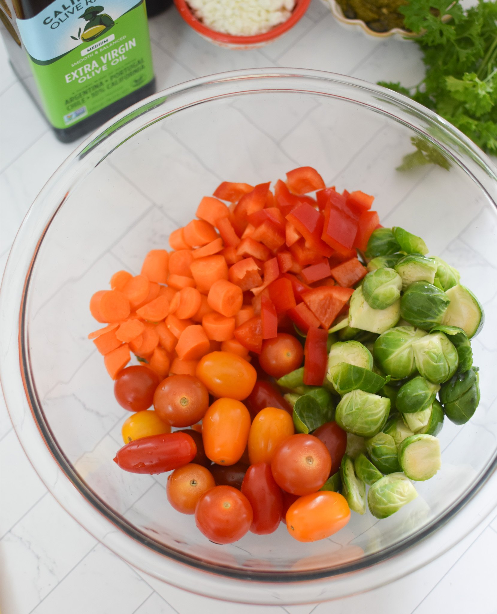 Roasted Vegetable Goat Cheese Flatbread Pizza Recipe vegetables in a bowl. 