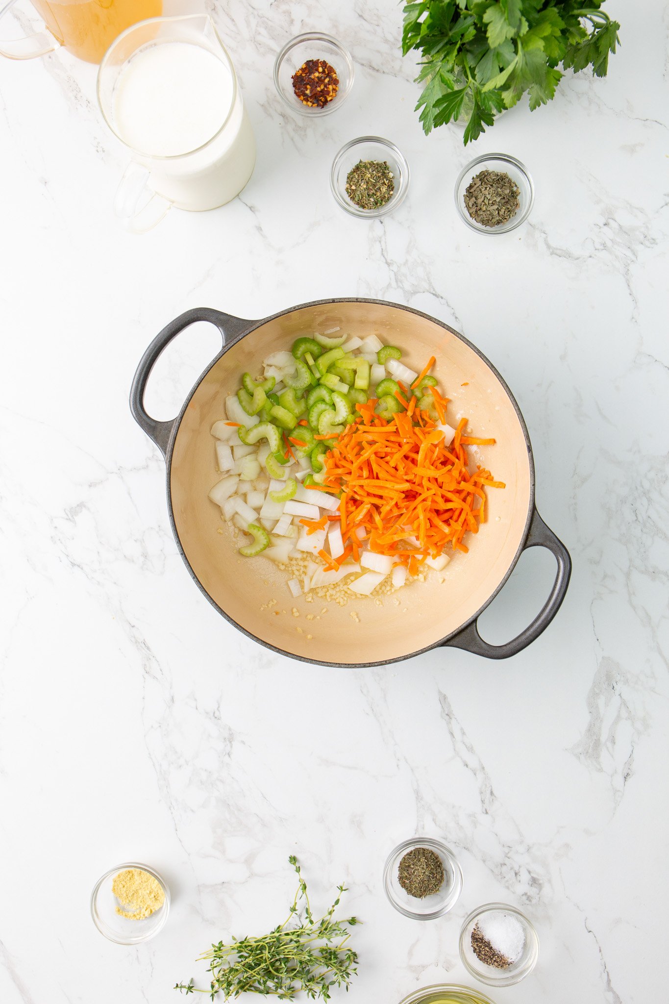 Copycat Olive Garden Chicken Gnocchi Soup Recipe vegetables in a pot. 