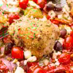 Mediterranean Sheet Pan Chicken on a sheet pan with feta cheese