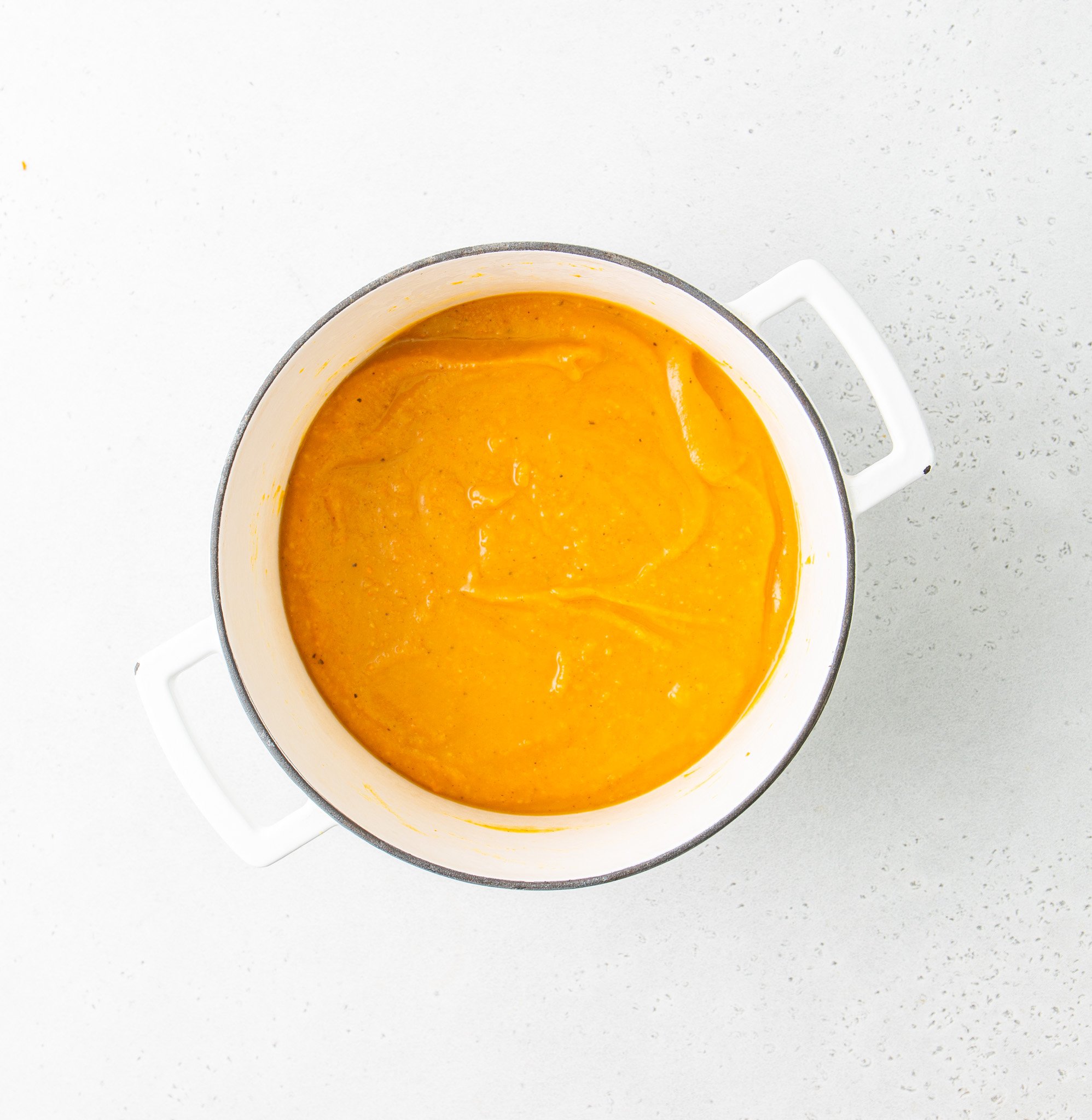 Easy Roasted Butternut Squash Soup blended in a dutch oven. 